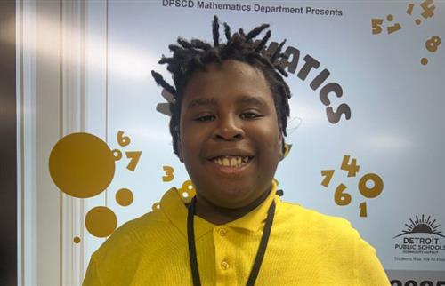  Boy smiling as top place math bee winner